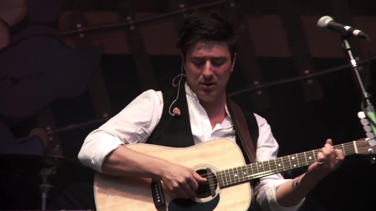 Marcus Mumford drops in - the festival's pull reaches far beyond bluegrass. 