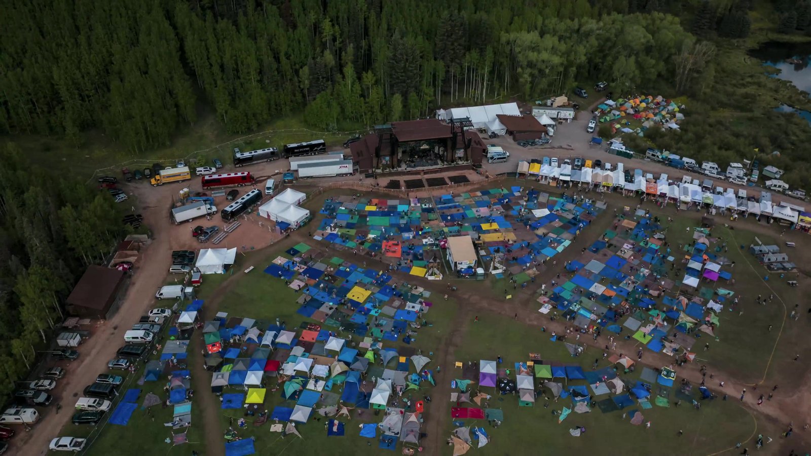 The festival grounds from above, wedged between canyon walls.